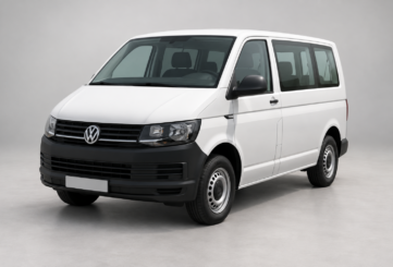 A white passenger Volkswagen Transporter with black bumpers.