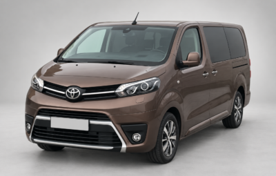 Brown passenger Toyota Proace, front and side view.